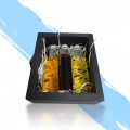 Caja de 3 botellitas de licor: café, hierbas y miel